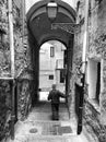 ITALY, SANREMO - MAY 6, 2017 old man goes down the stairs