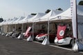 Alfa Romeo vintage historical cars aligned in circuit paddock