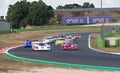 Race cars during formation lap on racetrack, prototype group of Le Mans series Royalty Free Stock Photo