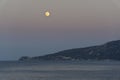 Italy Sicily Aeolian Islands, Salina Island, full moon Royalty Free Stock Photo