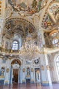 Italy, Stupinigi - January 2023: luxury interior of Royal Palace with baroque design and window