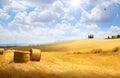 Italy summer or autumn golden countryside landscape, Wheat Straw Bales and farmland over sunset sky Royalty Free Stock Photo