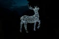 A bright Christmas deer in Molveno
