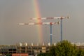 Italy Tuscany Pisa, Cisanello hospital under construction, construction site crane with rainbow Royalty Free Stock Photo