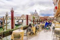 ITALY, VENICE APRIL 19, 2017: A street cafe on a grand canal in