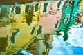 Italy, Venice, Burano island. Reflection of colorful houses in water canal. Royalty Free Stock Photo