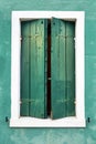 Italy, Venice, Burano island. Traditional colorful walls and windows of the old houses. Royalty Free Stock Photo