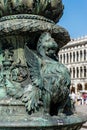 Italy, Venice, a close up of a statue of flying lion on lamp post