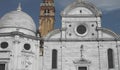 Italy- Venice- Close Up of a White Domed Building and Red Brick Tower Royalty Free Stock Photo