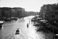 Italy, Venice, February 25, 2017. black and white photo of Venice street with lots of gondolas, river and facades of houses