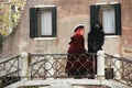 ITALY, VENICE - February 28 2017: Venice Carnival. man and woman in masks on deck Royalty Free Stock Photo