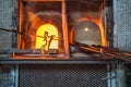 Italy, Venice, glass horse and Murano factory special glass-blowing tools: red-hot furnace with fire to make the glass