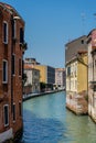 Italy, Venice, a narrow river in a city Royalty Free Stock Photo