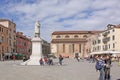 Italy. Venice. Streets and squares. Tourists with map near Monument