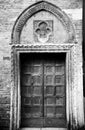 ITALY, VENICE. 11-11-2018: Streets of Venice. Architectural door. Black and white