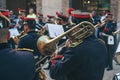 Italy, Verona, May 31, 2019: A military trumpeter plays the trumpet on a street performance