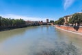 Italy.Verona.View of the Adige river.The Scaliger Bridge and Castelvecchio Castle are visible in the distance. Royalty Free Stock Photo