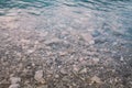 Italy view of the bottom of the beach mountain lake lago di ice in summer in cloudy weather Royalty Free Stock Photo