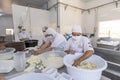 Production of traditional artisanal buffalo cheese mozzarella, in Itanhandu, countryside of Minas Gerais state, Brazil