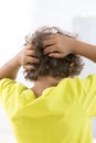 Itchy Scalp from Head Lice back view Royalty Free Stock Photo