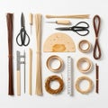 Items include two pairs of scissors, a measuring tape, awls with Royalty Free Stock Photo