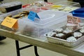 Items set up on a table at a bake sale