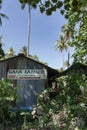 Thailand, Raya Island, December 31, 2019: racha. a sign for a restaurant on an old barn in the middle of a thicket