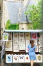 Itinerant art dealer on the quays of Paris