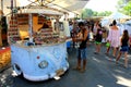 An itinerant blue car-shaped stall for selling handicraft in the Hippy Market of Ibiza Island in Spain