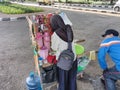 Itinerant coffee drink sellers make a living on the outskirts of the capital city of JakartaÃ¯Â¿Â¼