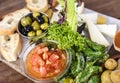 Itional food of Canary Islands: Tomatos, pepers, olives, salad, cheese, bread and potatoes, Canary Islands