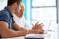 Its all in the details. two men working in the office. Royalty Free Stock Photo