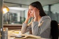 Its all French to me. a young businesswoman looking stressed while using a computer at her desk in a modern office. Royalty Free Stock Photo