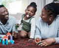Its all fun and games at home. a happy family playing with wooden blocks together at home. Royalty Free Stock Photo