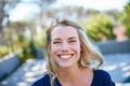 Its all sunshine and smiles. Portrait of a beautiful young woman enjoying a day outside. Royalty Free Stock Photo