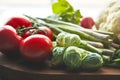 Its as fresh as it gets. a variety of fresh produce on a wooden chopping board.