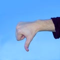 Its bad, bad sign with hand and finger, tree signs with same hand aginst sky ok, bad and good Royalty Free Stock Photo