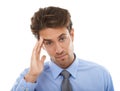 Its been a long day. Studio shot of an exhausted-looking businessman isolated on white.