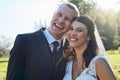 Its the beginning of forever. Portrait of a bride and groom standing outside on their wedding day. Royalty Free Stock Photo