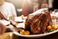 Its beginning to look a lot like Christmas...an unrecognizable person cutting into a turkey at Christmas lunch. Royalty Free Stock Photo