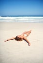 Its bikini season. an attractive young woman lying on the beach in a bikini. Royalty Free Stock Photo
