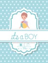 Its a boy baby shower card with kid and plastic balloon