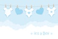 Its a boy welcome greeting card for childbirth with hanging hearts and bodysuits Royalty Free Stock Photo