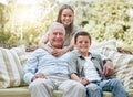 Its difficult to put into words how much they mean to me. a senior man sitting outside with his two grandchildren. Royalty Free Stock Photo