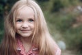 Its easy to make me happy. Small girl with blond hair. Little girl wear long hair. Happy little child with adorable Royalty Free Stock Photo