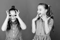 Its funny. Funny children. Funny little girls enjoy playing together. Small kids gesturing and making funny faces for Royalty Free Stock Photo