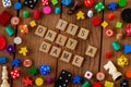 `Its Only a Game` spelled out in wooden letter tiles