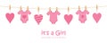 its a girl welcome greeting card for childbirth with hanging hearts and bodysuits Royalty Free Stock Photo