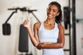 Its always a good day when youre working out. a sporty young woman showing thumbs up at the gym. Royalty Free Stock Photo