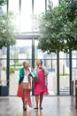 Its how they like to spend retirement. Full length shot of a two senior women out on a shopping spree. Royalty Free Stock Photo